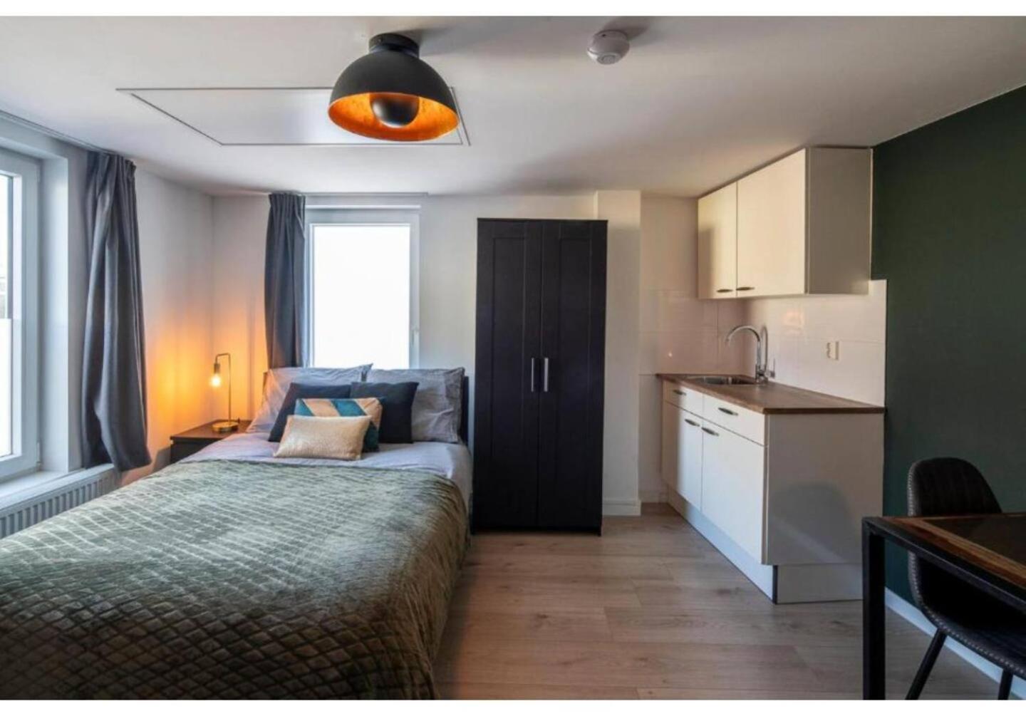B&K Urban City Suites Тилбург Экстерьер фото