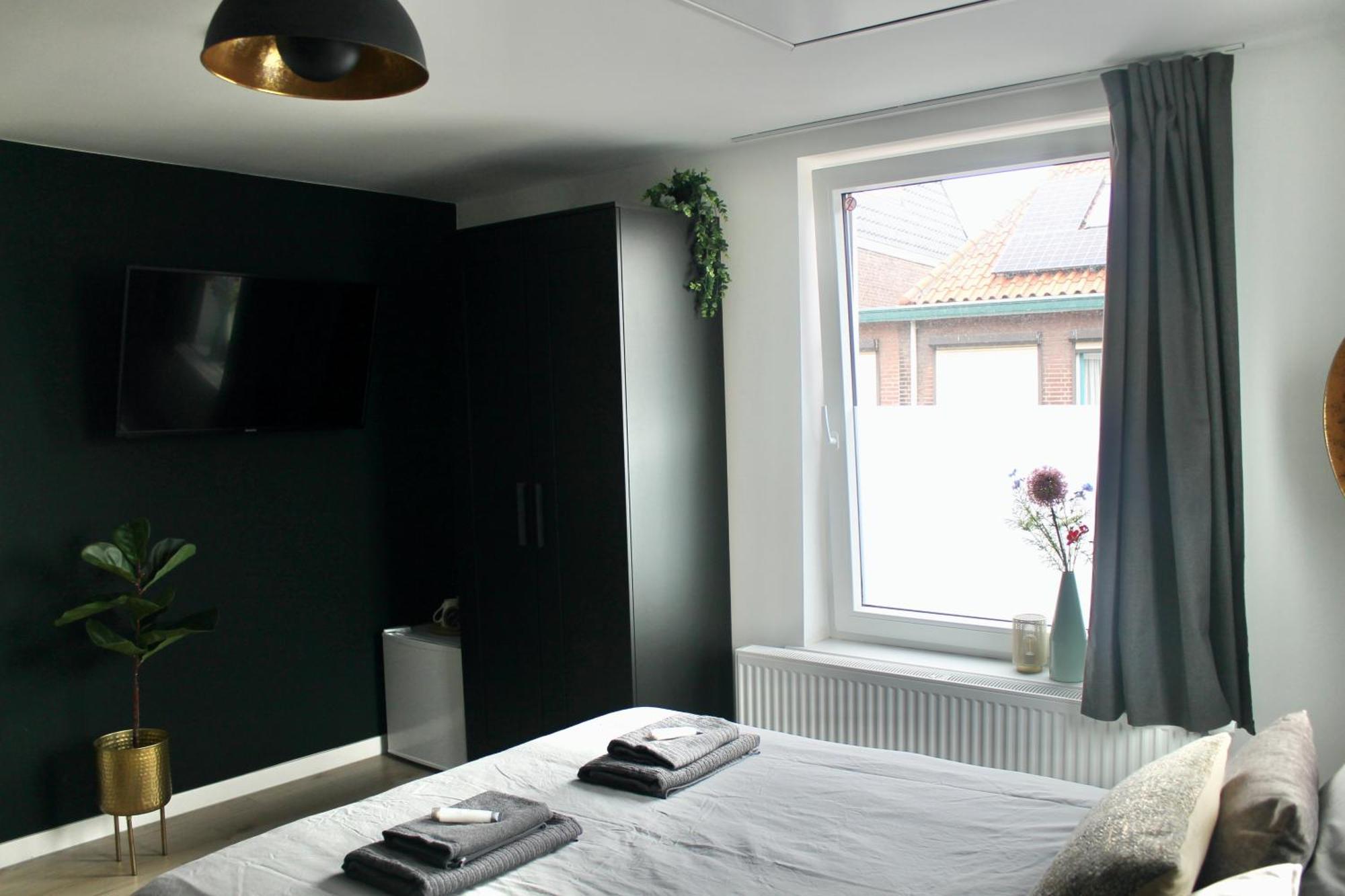 B&K Urban City Suites Тилбург Экстерьер фото