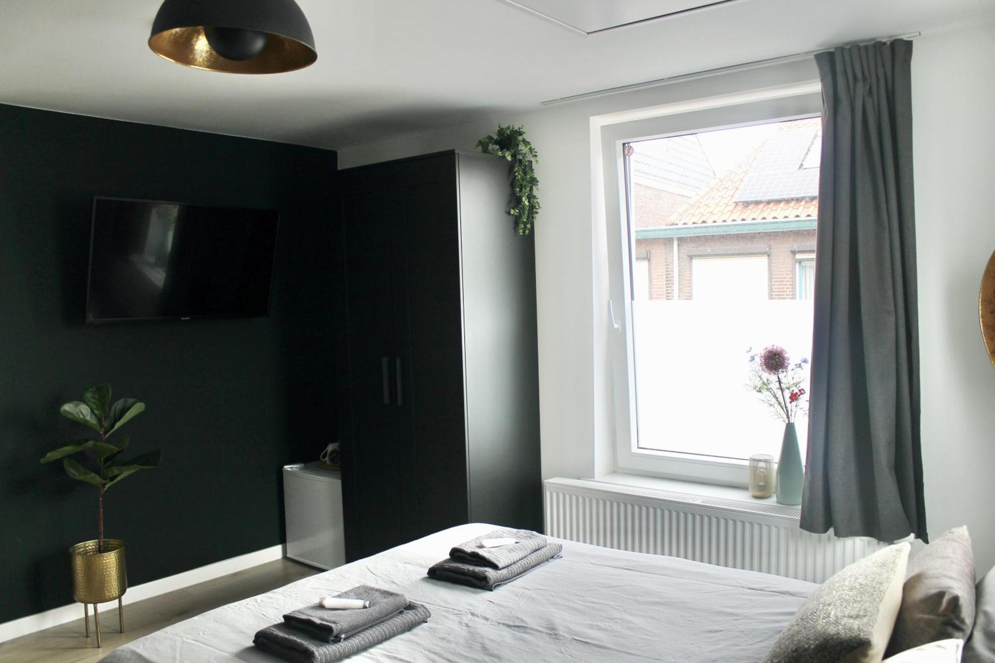 B&K Urban City Suites Тилбург Экстерьер фото